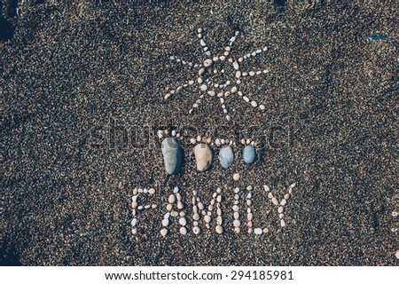 Happy feet. Stone arranged like a footprint on the beach