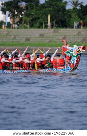 YILAN TAIWAN - JUNE 2: Rowers row their boat. The Dragon Boat Festival on the Dongshan River on June 2, 2014 in Yilan