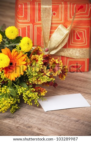 summer flowers bouquet with a gift