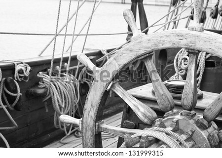 Steering wheel of an ancient sailing vessel. Close up