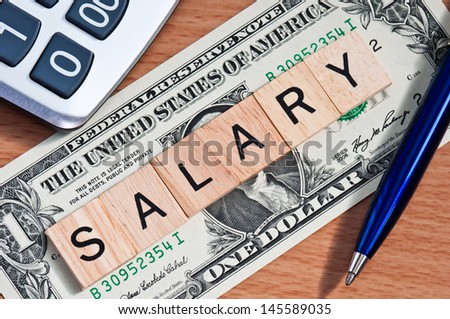 The letters SALARY on  dollar banknote business concept