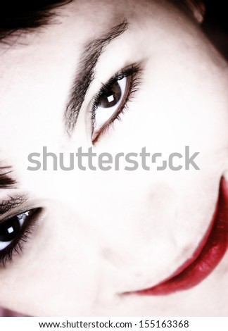 Closeup of beautiful young woman face.