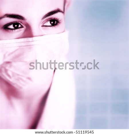 Female doctor with mask isolated on blue.