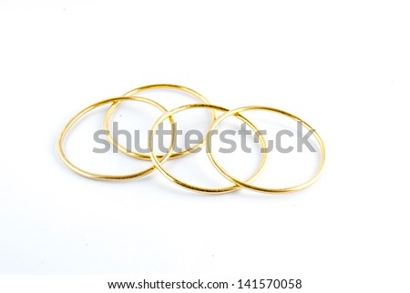 golden bracelets - bracelets isolated on the white background