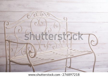 White metal benches on white background
