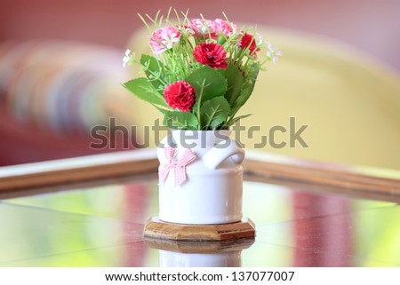 Pink and Red flowers in a vase