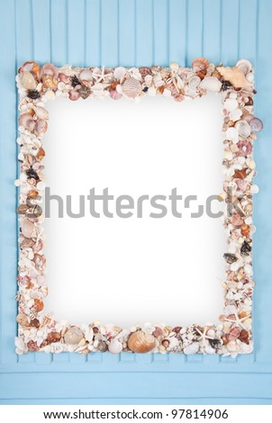 Mirror Shellfish decoration frame on blue wood background