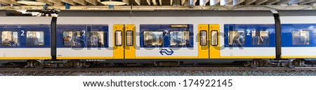 ZWOLLE, THE NETHERLANDS - FEBRUARY 3, 2014: A Sprinter SLT passenger train of the Nederlandse Spoorwegen waiting in the train station