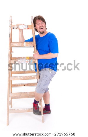 Smiling man holding a ladder isolated on a white background