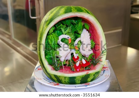 Fruit Carving of birds in a watermelon for a banquet display