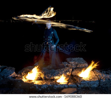 Fire show juggling samurai sword