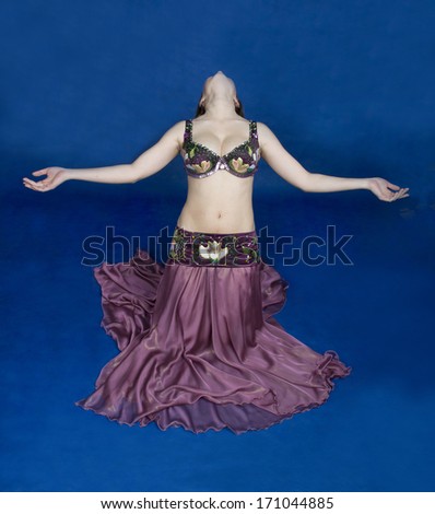 Oriental dance model on a blue background