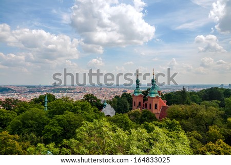 Landscape of Prague city center and church in park, aerial view