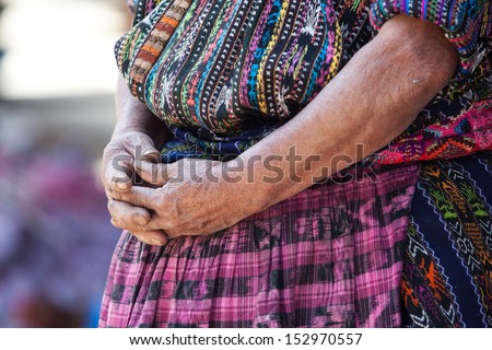 Senior woman in ethnic traditional Latin American dress. Travel background for Guatemala.