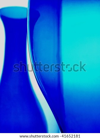 Abstract glassware background design made from a wine glass and vases.