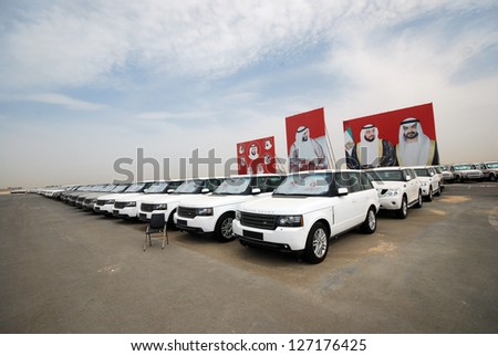 ABU DHABI, UNITED ARAB EMIRATES - APRIL 10: Prizes for camel racing April 10, 2012 in Abu Dhabi, UAE. The cars are prizes for winners of a race, the winner can choose a car out of these 4x4 cars.