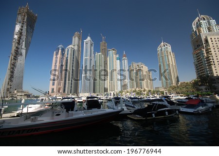 DUBAI, UNITED ARAB EMIRATES - OCTOBER 30: Overview of the Dubai Marina October 30, 2011 in Dubai, United Arab Emirates. The marina with skyscrapers and luxurious yachts.
