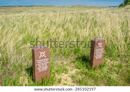 CROW AGENCY, MONTANA?? MAY 21, 2012: Two headstones mark the location where two Cheyenne warriors were killed on June 25, 1876 when attacked by General George Armstrong Custer and his men.