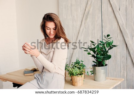 Similar – Image, Stock Photo Relaxed woman with cup of coffee in hammock