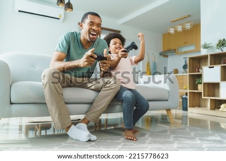 Similar – Image, Stock Photo Little gamer celebrating victory in VR game