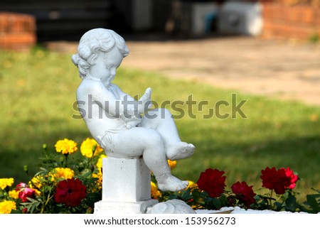 The Boy sculpture in the garden