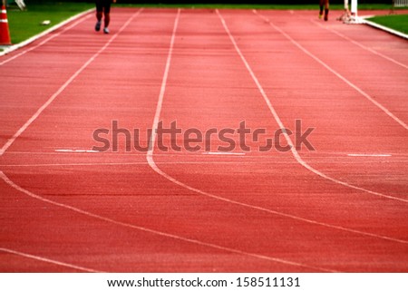 Athlete on track in the stadium