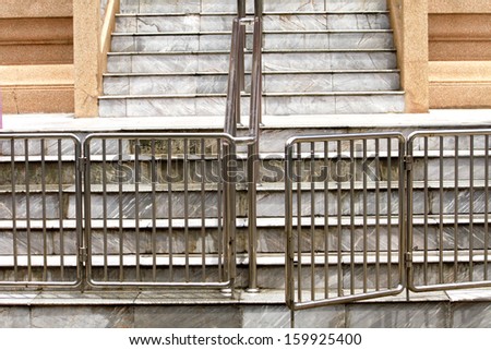 Steel fence of concrete step