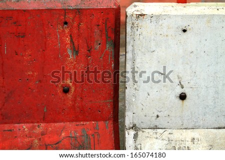 White and red color concrete barrier