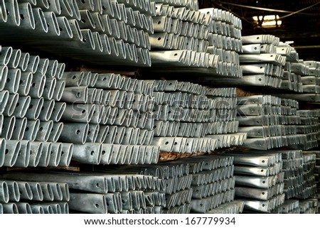 Steel tubes bunch on the rack in warehouse
