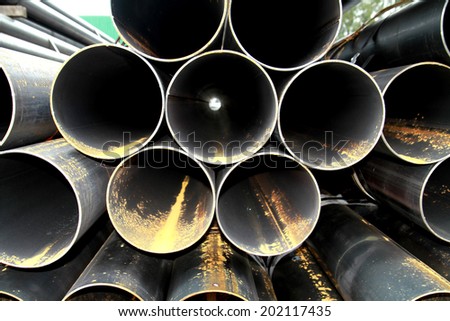 Rust steel pipes bunch in warehouse