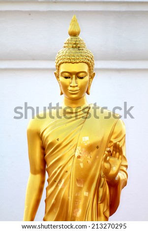 NAKHONPRATOM-THAILAND-1 MARCH : Statue of Buddha leela standing posture on 1 March 2014 in Nakhonpratom Province, Thailand.