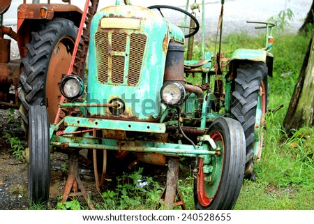 NAKHONPHATHOM-THAILAND-OCTOBER 11 : A Part of the old tractor shown in the Jessada Technic Museum on October 11, 2014 , Nakhonphathum Province, Thailand.