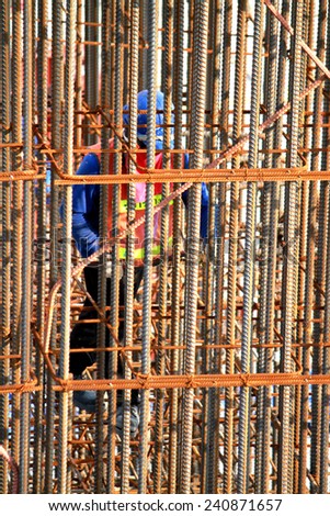 NONTHABURI-THAILAND-SEPTEMBER 20 : The worker welding for construction concrete bridge over the river at worksite on September 20, 2014, in Nonthaburi, Thailand