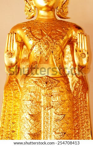 BANGKOK-THAILAND-JANUARY 1 : Golden Buddha Statue leela standing posture in wat pho temple on January 1, 2015 Bangkok, Thailand