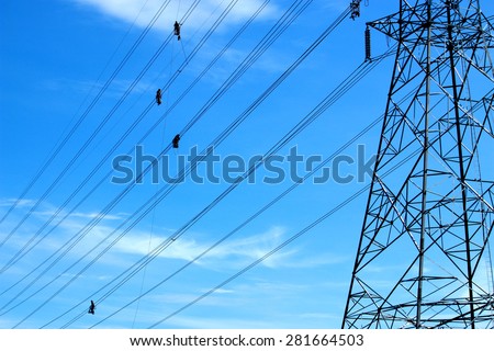 SARABURI-THAILAND-MAY 19 : 500 kV extra high voltage transmission line under installation of line conductor and hardware accessories on May 19, 2015 in Saraburi Province, Thailand