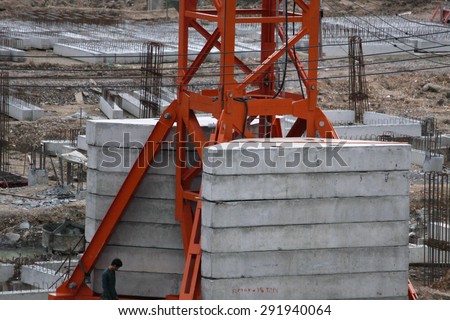 NONTHABURI-THAILAND-SEPTEMBER 20 : Construction crane for Bridge construction under of new railway project on September 20, 2014 Nonthaburi Province, Thailand.