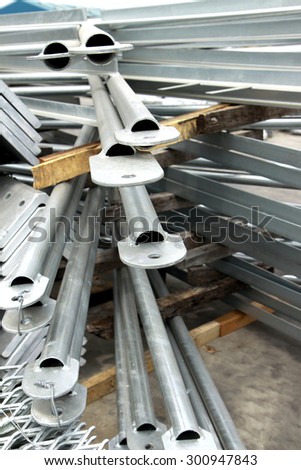 Hot-dip galvanized steel pipes bunch on the rack in warehouse before shipment