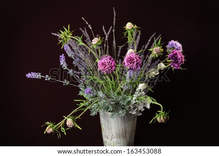 bouquet of artificial flowers isolated on a black background