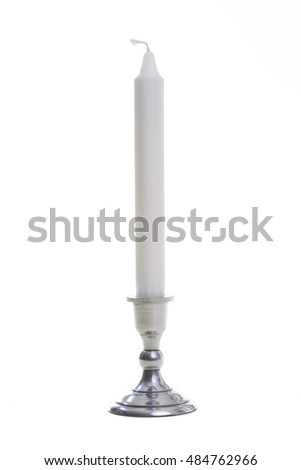 Similar – Image, Stock Photo A burning long white candle in the church behind an ornamental lattice