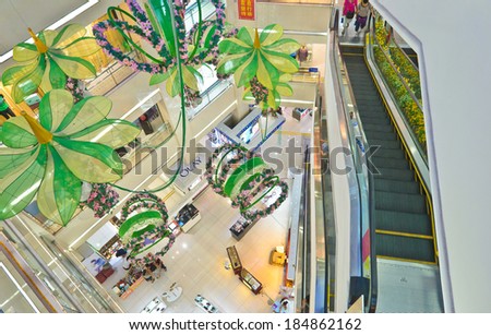 MIANYANG,CHINA - JULY 31,2011:Modern mall interior.This super mall is named MeiXi merchandise which is the biggest mall in mianyang,china.