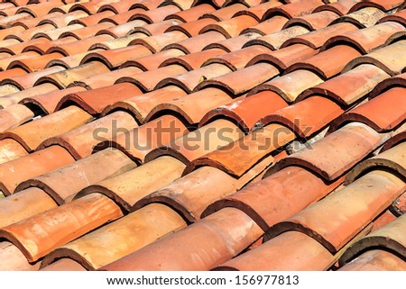 texture rows of round red tiles on the roof