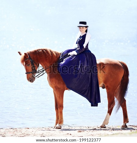 Lady on a  horse. The aristocrat on a riding walk.