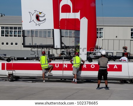 VENICE, ITALY - MAY 10: Luna Rossa AC45 (Piranha) in the team bases area waiting for a new test in the Venice lagoon during the America\'s Cup previous races days in May 10, 2012 in Venice, Italy.