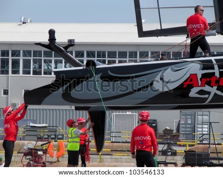 VENICE, ITALY - MAY 11: Artemis Team AC45 catamaran in the team bases area is going to be moved in the sea for tests during the America\'s Cup first races days in May 11, 2012 in Venice, Italy.