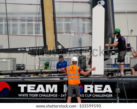 VENICE, ITALY - MAY 11: Team Korea AC45 in the team bases area waiting for a new test in the Venice lagoon during the America\'s Cup previous races days in May 11, 2012 in Venice, Italy.
