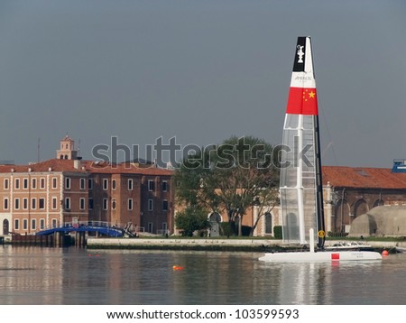 VENICE, ITALY - MAY 11: Team Korea catamaran in the AC Village area waiting for a new test in the Venice lagoon during the America's Cup previous races days in May 11, 2012 in Venice, Italy.