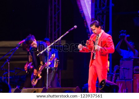 HUA HIN, THAILAND - DECEMBER 31 : Lead singer Slot Machine of the rock band performs live concert during Hua Hin Music Countdown 2013 on December 31, 2012 in Hua Hin, Prachuapkhirikhan, Thailand