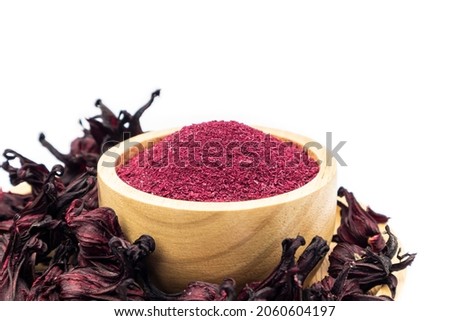 Powder of Roselle flower buds in wooden bowl and dried roselle isolated on white background Foto stock © 