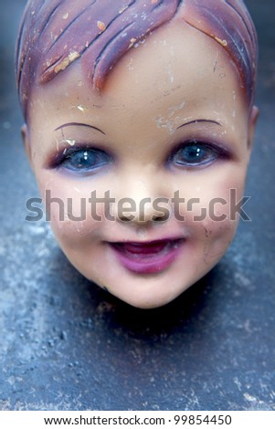 Head of a cardboard model in a flea market