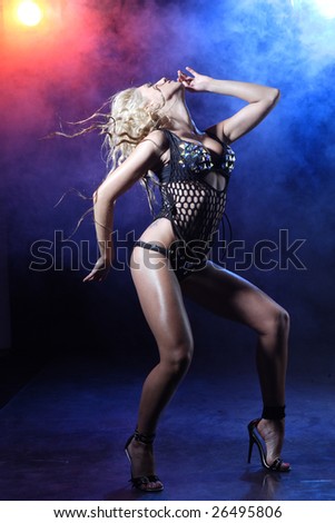 nightclub go-go style dancer is posing